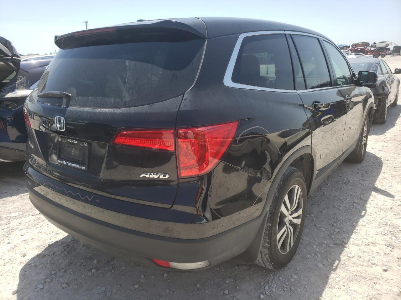 Photo 4 from auction – 2016 HONDA PILOT EXL with VIN 5FNYF6H50GB104794