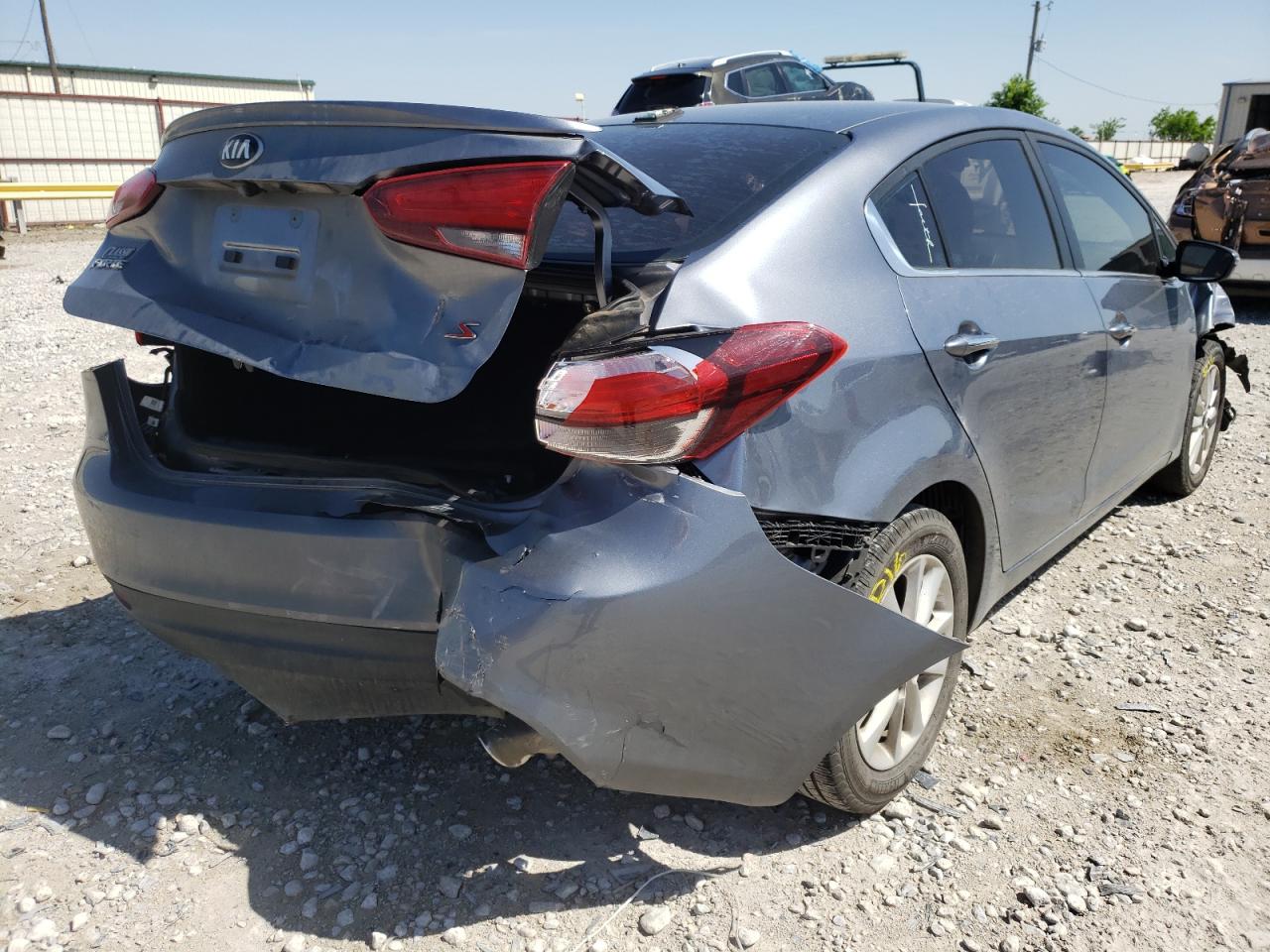 Photo 13 from auction – 2017 KIA FORTE LX with VIN 3KPFL4A7XHE022370