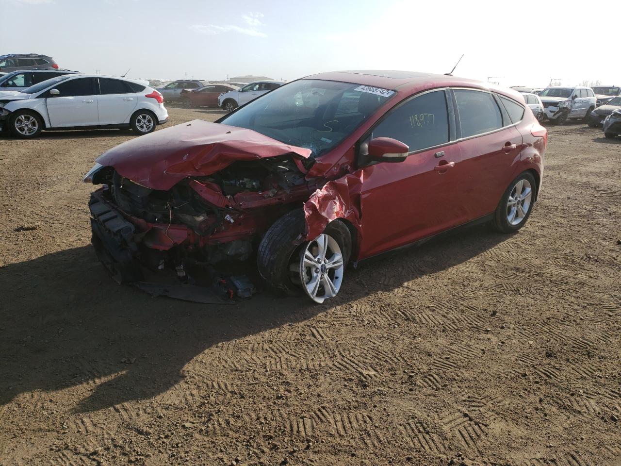 Photo 2 from auction – 2012 FORD FOCUS with VIN 1FAHP3K27CL267675