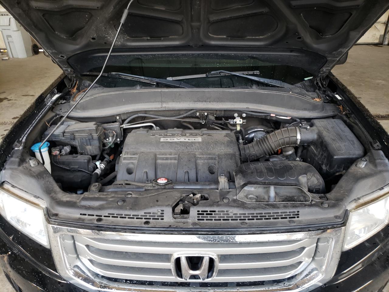 Photo 7 from auction – 2013 HONDA RIDGELINE with VIN 5FPYK1F51DB012842