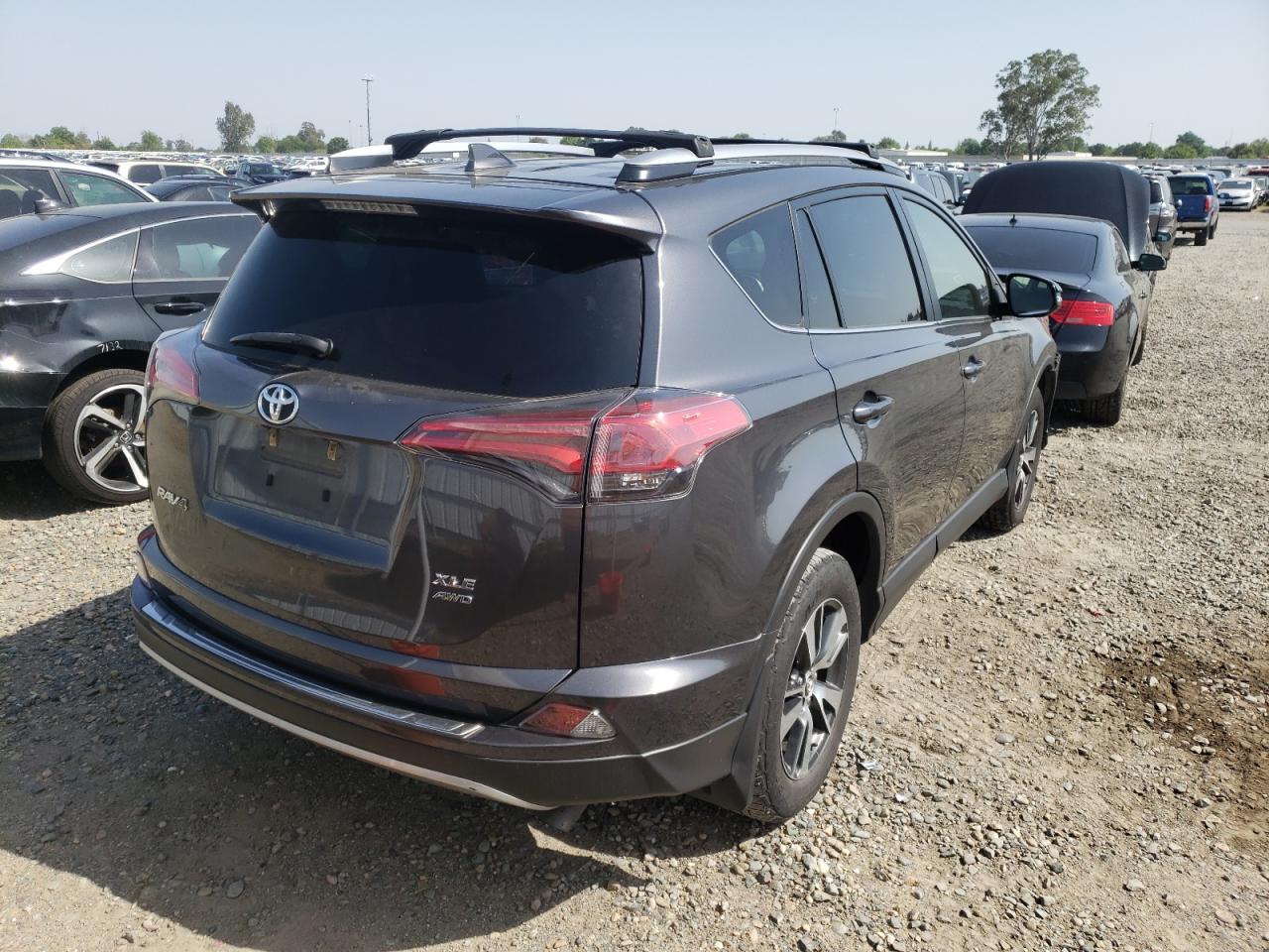 Photo 4 from auction – 2017 TOYOTA RAV4 XLE with VIN JTMRFREV9HJ710826