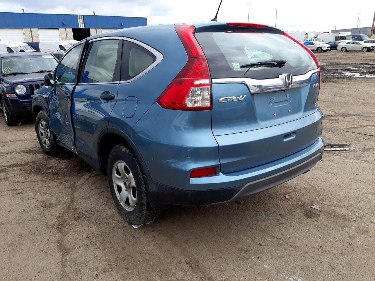 Photo 3 from auction – 2015 HONDA CR-V LX with VIN 5J6RM4H38FL071739
