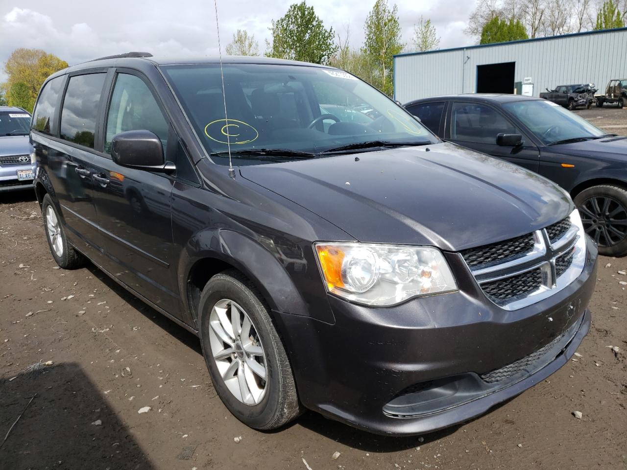 DODGE GRAND CARA 2015 with VIN 2C4RDGCG2FR732741 - Photo from auction