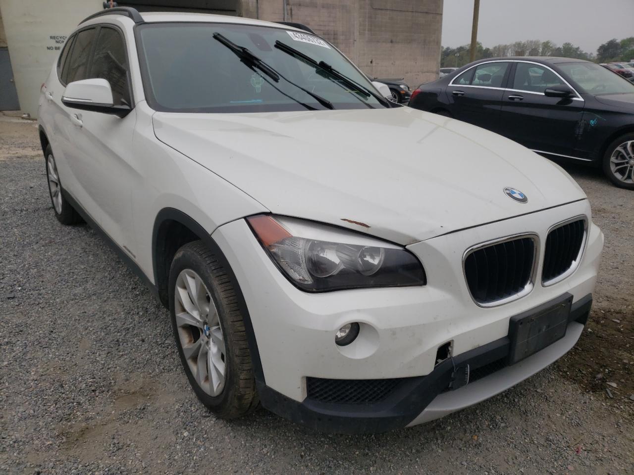 BMW X1 XDRIVE2 2014 with VIN WBAVL1C58EVY22143 - Photo from auction