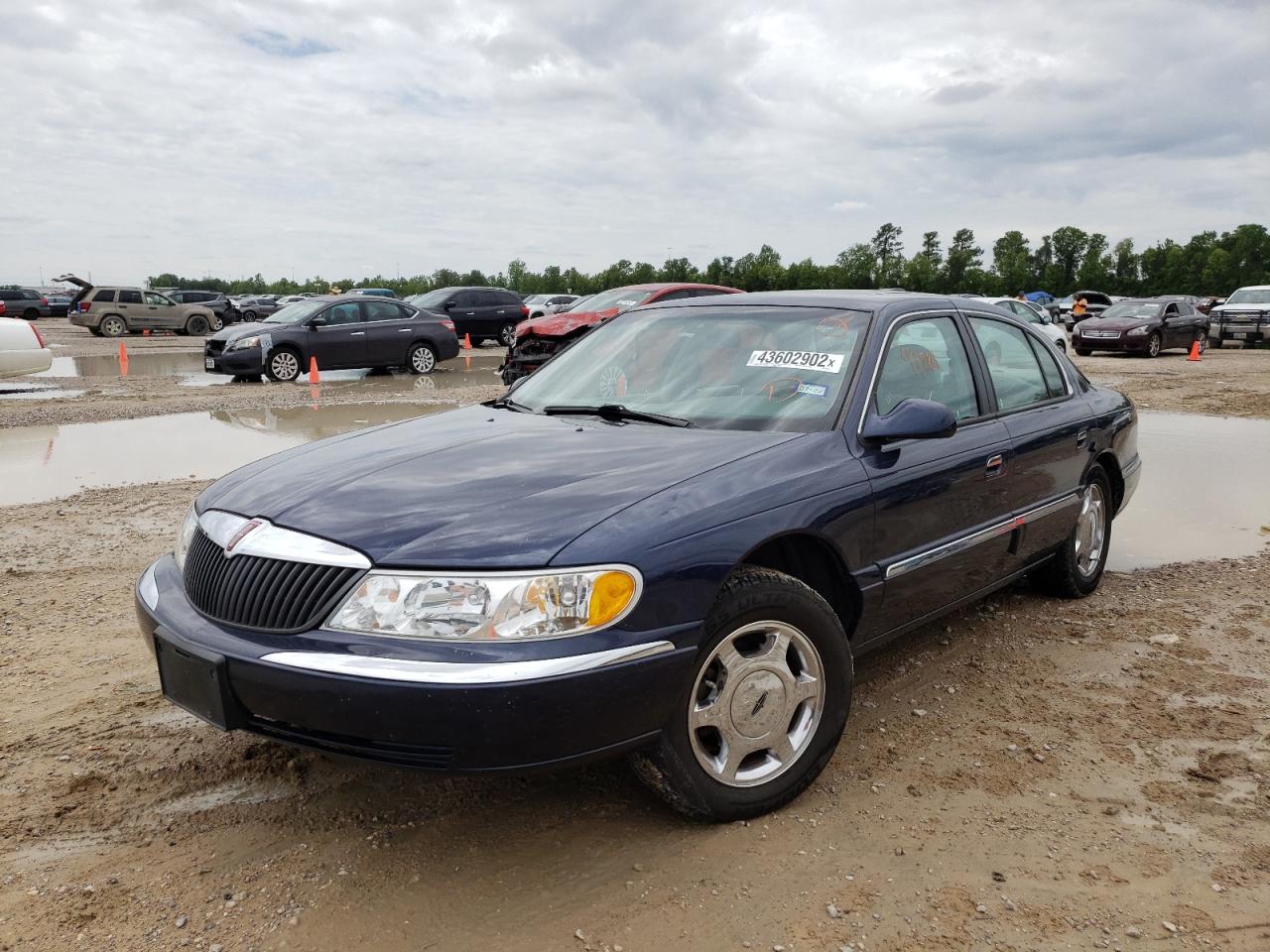 Photo 2 from auction – 2002 LINCOLN CONTINENTA with VIN 1LNHM97V32Y632214