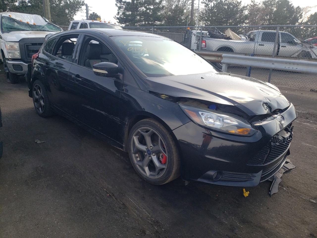 FORD FOCUS ST 2014 with VIN 1FADP3L93EL398390 - Photo from auction