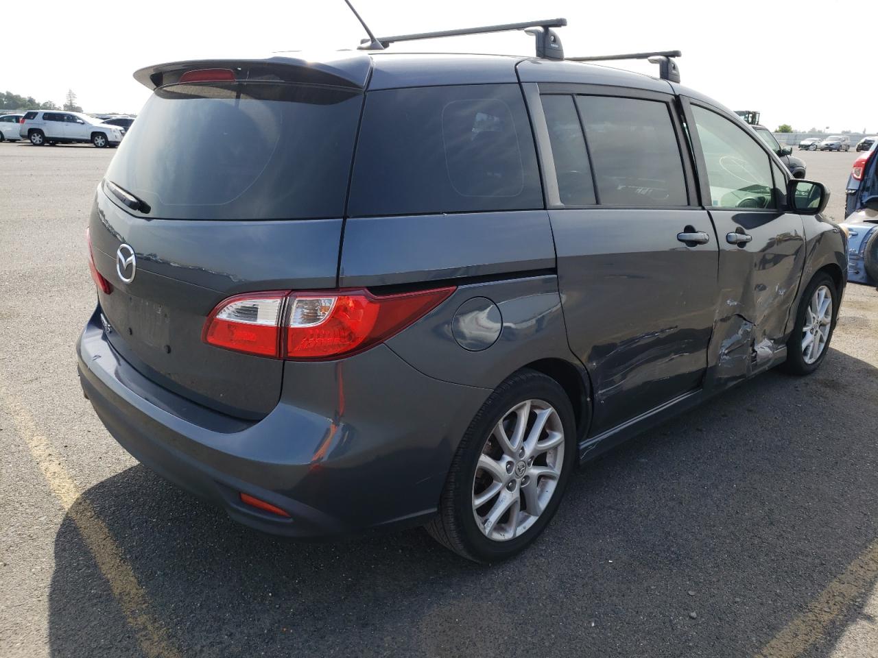 Photo 4 from auction – 2012 MAZDA 5 with VIN JM1CW2CL3C0124474