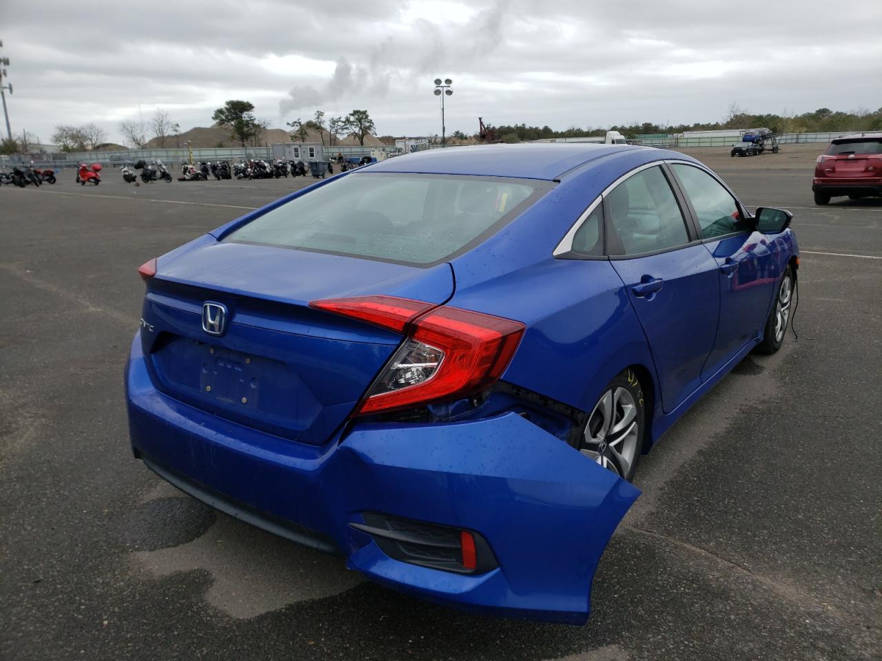 Photo 14 from auction – 2017 HONDA CIVIC LX with VIN 2HGFC2F51HH542653