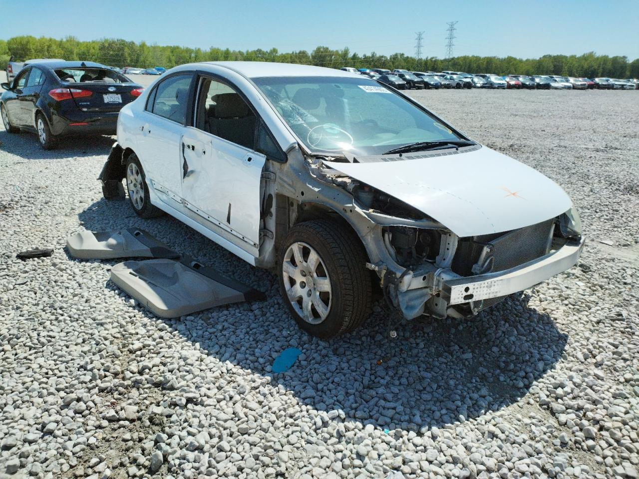 Photo 14 from auction – 2011 HONDA CIVIC LX with VIN 19XFA1F57BE032504