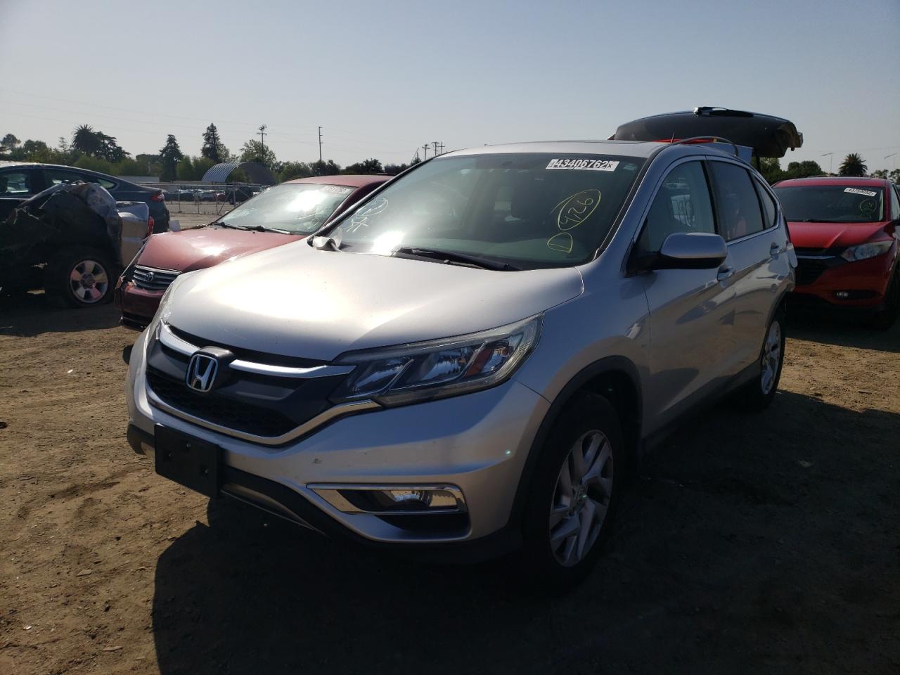 Photo 2 from auction – 2016 HONDA CR-V EX with VIN 2HKRM3H58GH549102