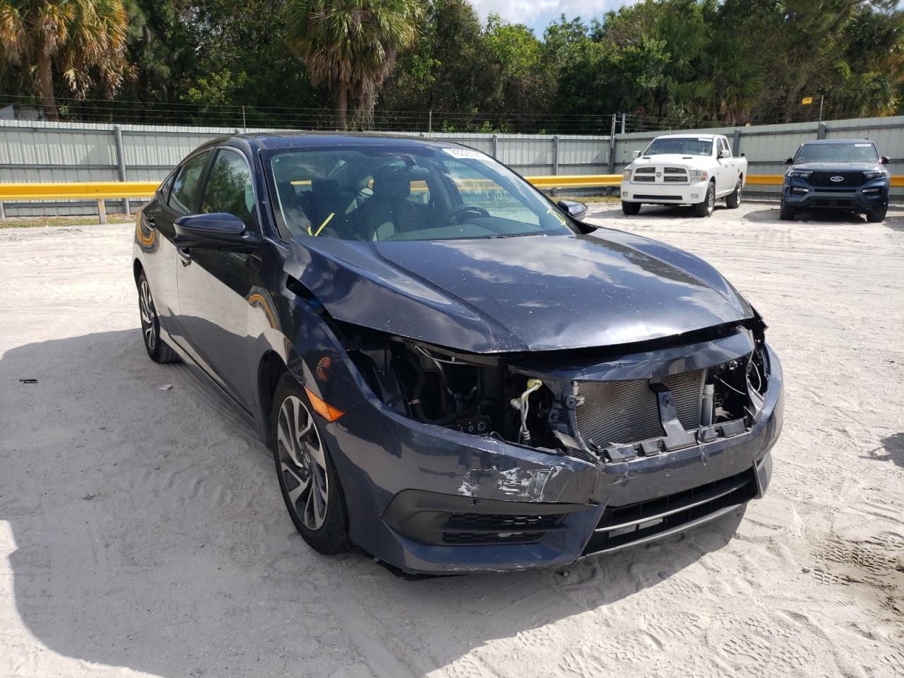 HONDA CIVIC EX 2018 with VIN 2HGFC2F71JH589348 - Photo from auction