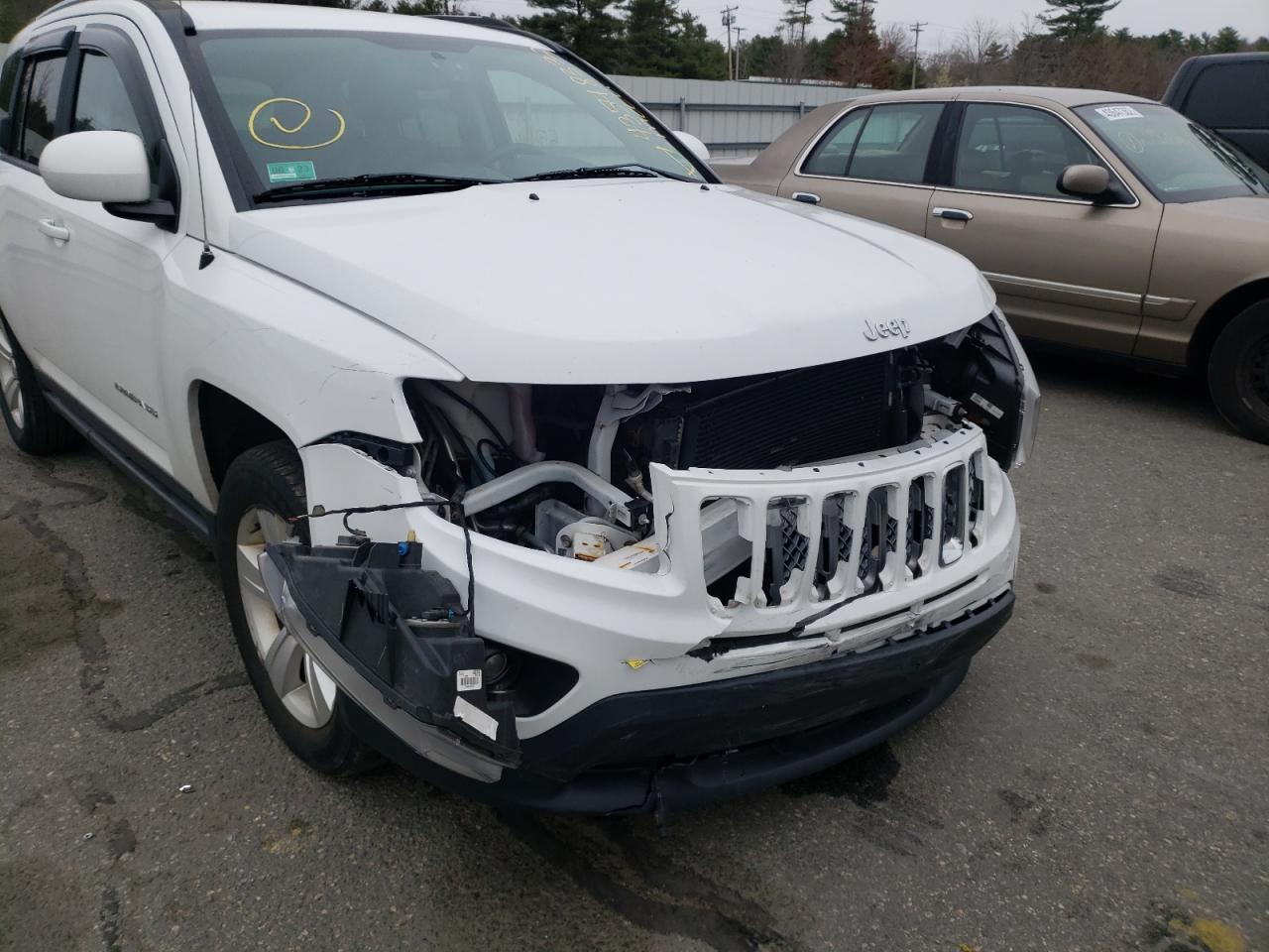 Photo 9 from auction – 2014 JEEP COMPASS LA with VIN 1C4NJDEB0ED846486