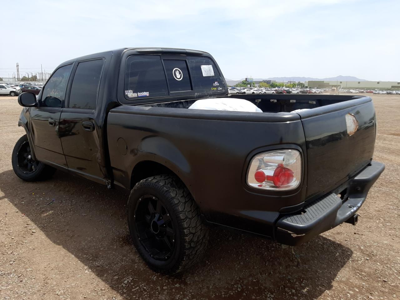 Photo 3 from auction – 2003 FORD F150 SUPER with VIN 1FTRW08L73KA58328