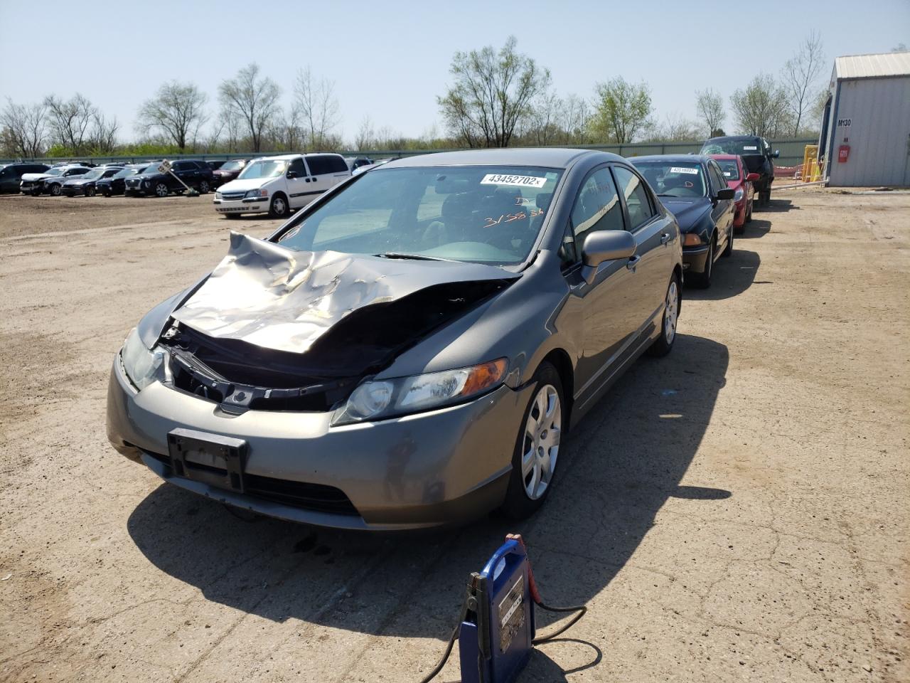 Photo 2 from auction – 2007 HONDA CIVIC LX with VIN 2HGFA16557H315836