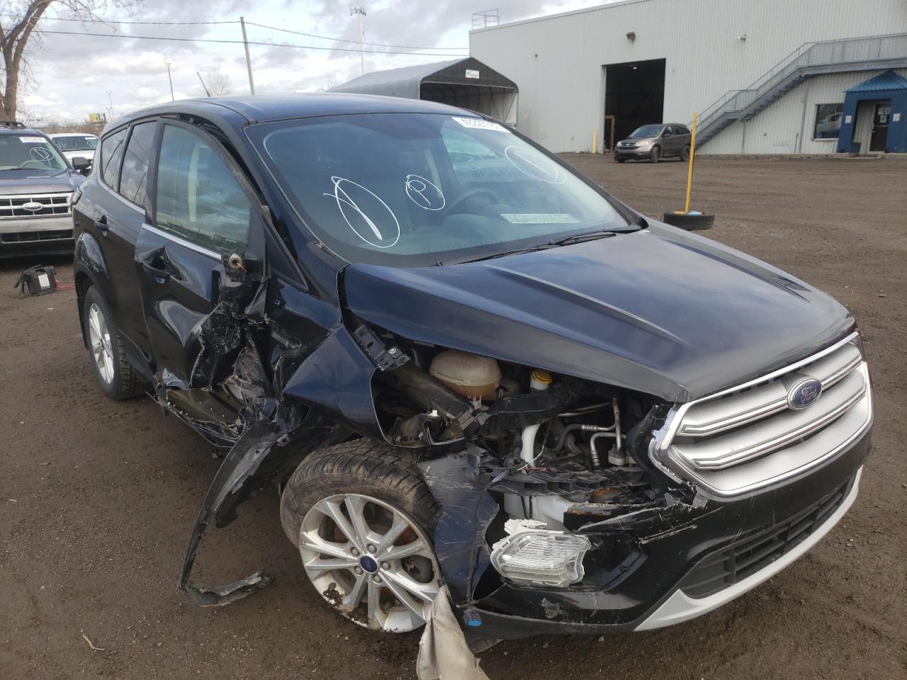 FORD ESCAPE SE 2017 with VIN 1FMCU0G9XHUB69464 - Photo from auction