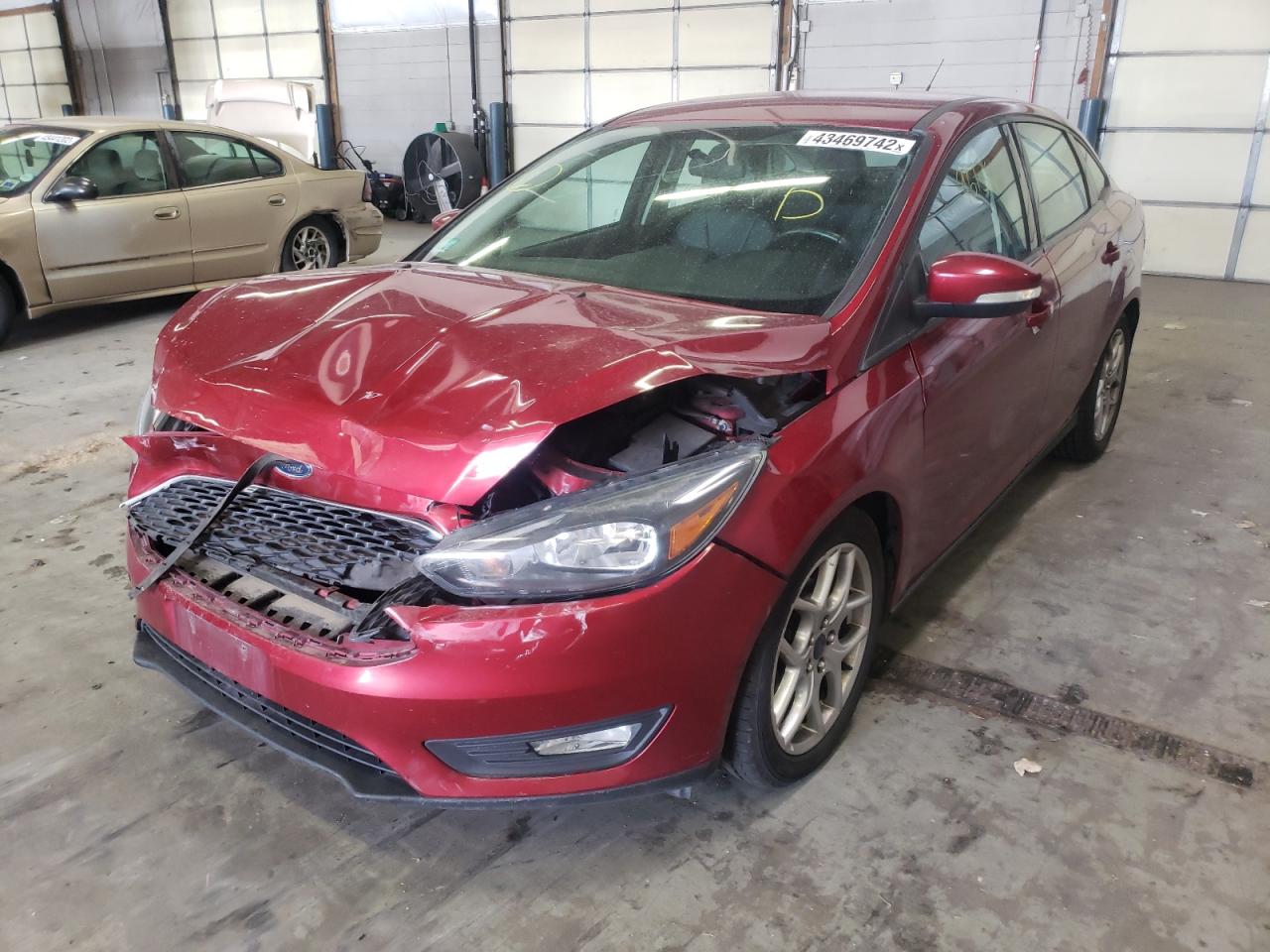 Photo 2 from auction – 2015 FORD FOCUS SE with VIN 1FADP3F20FL318267