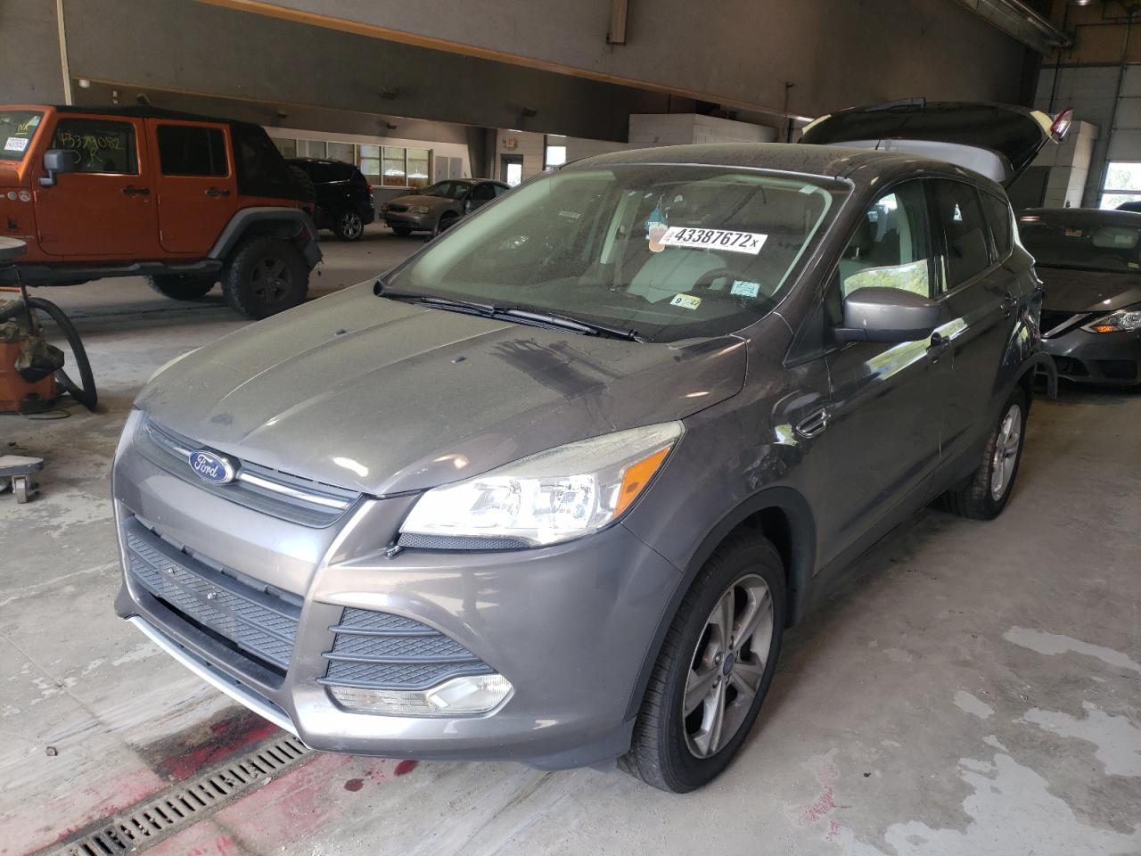 Photo 2 from auction – 2014 FORD ESCAPE SE with VIN 1FMCU0GX5EUA73252