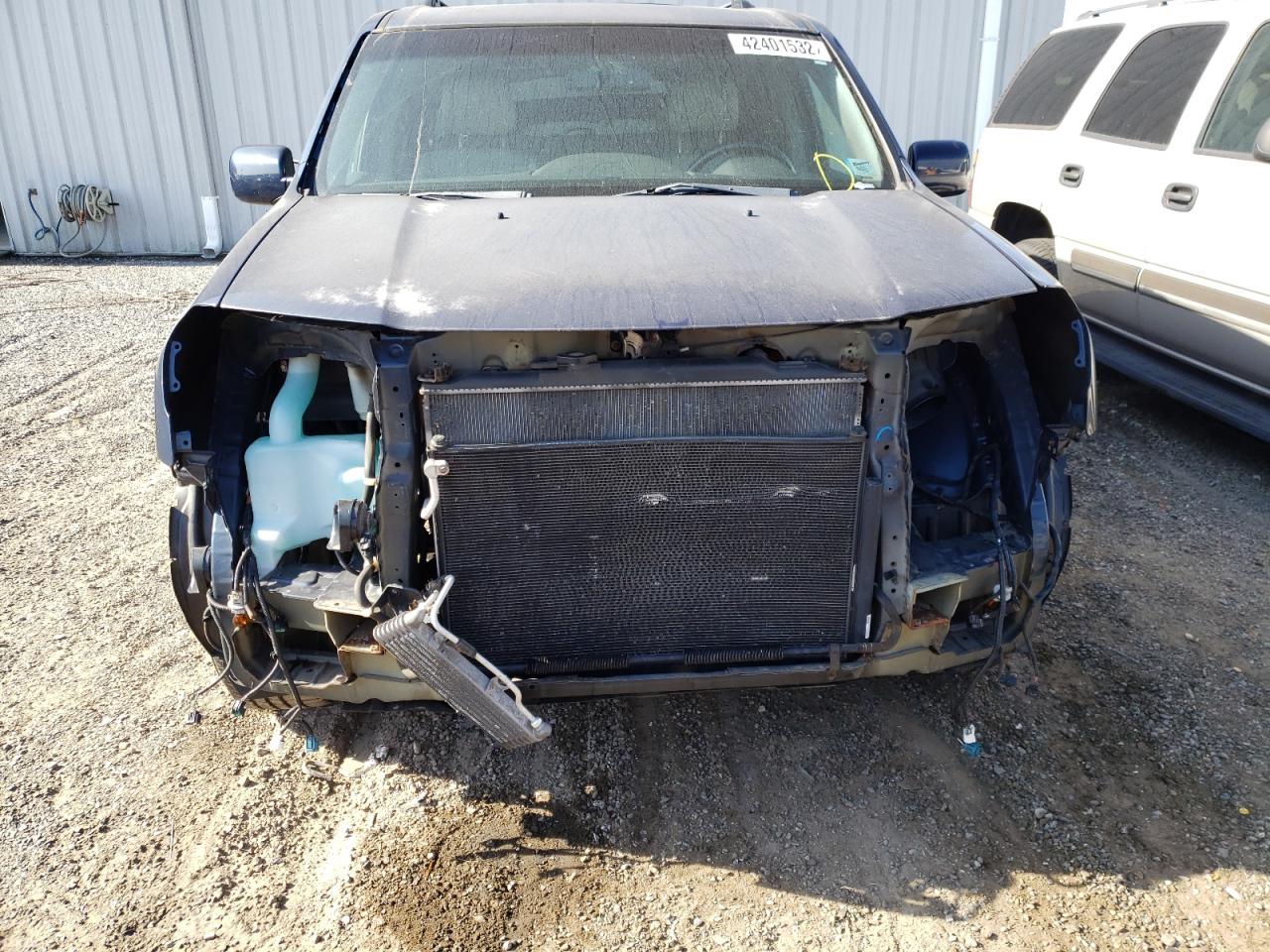 Photo 9 from auction – 2011 HONDA PILOT TOUR with VIN 5FNYF4H90BB094865