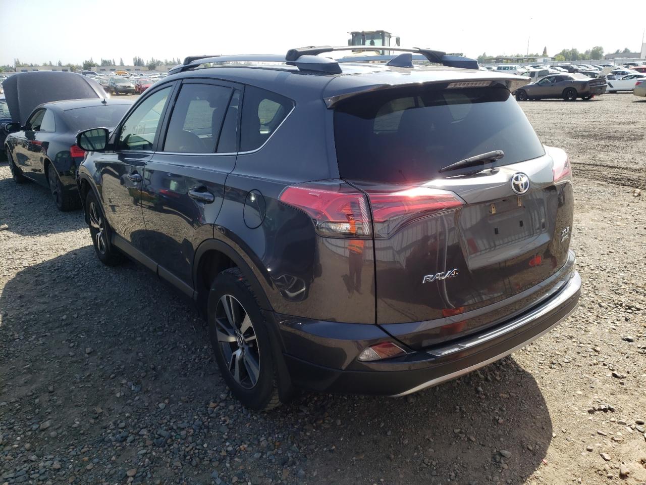 Photo 3 from auction – 2017 TOYOTA RAV4 XLE with VIN JTMRFREV9HJ710826