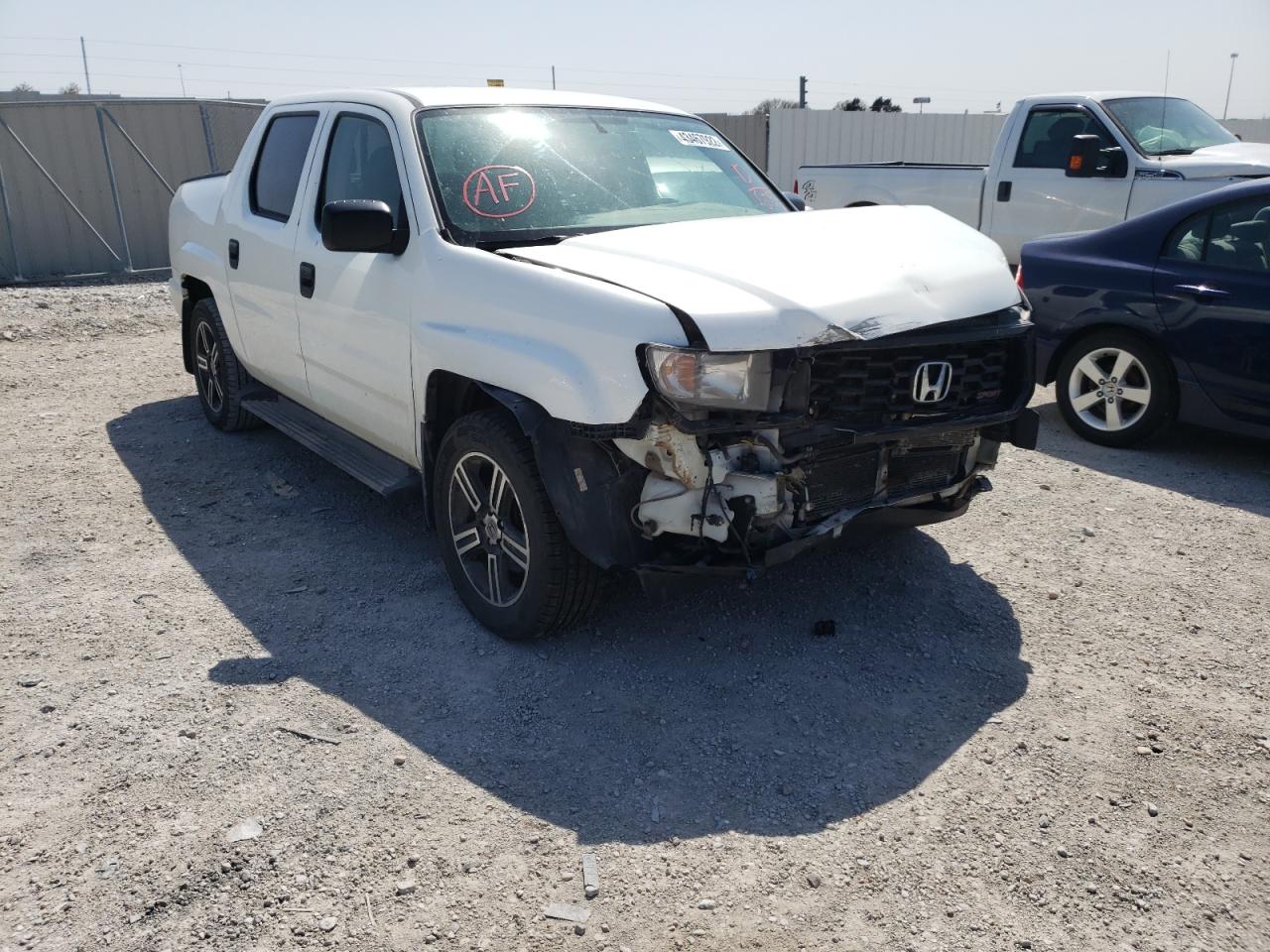 HONDA RIDGELINE 2013 with VIN 5FPYK1F79DB016753 - Photo from auction