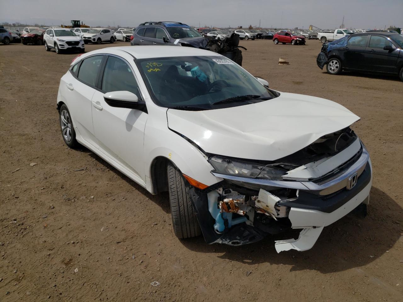HONDA CIVIC LX 2016 with VIN 2HGFC2F57GH523085 - Photo from auction