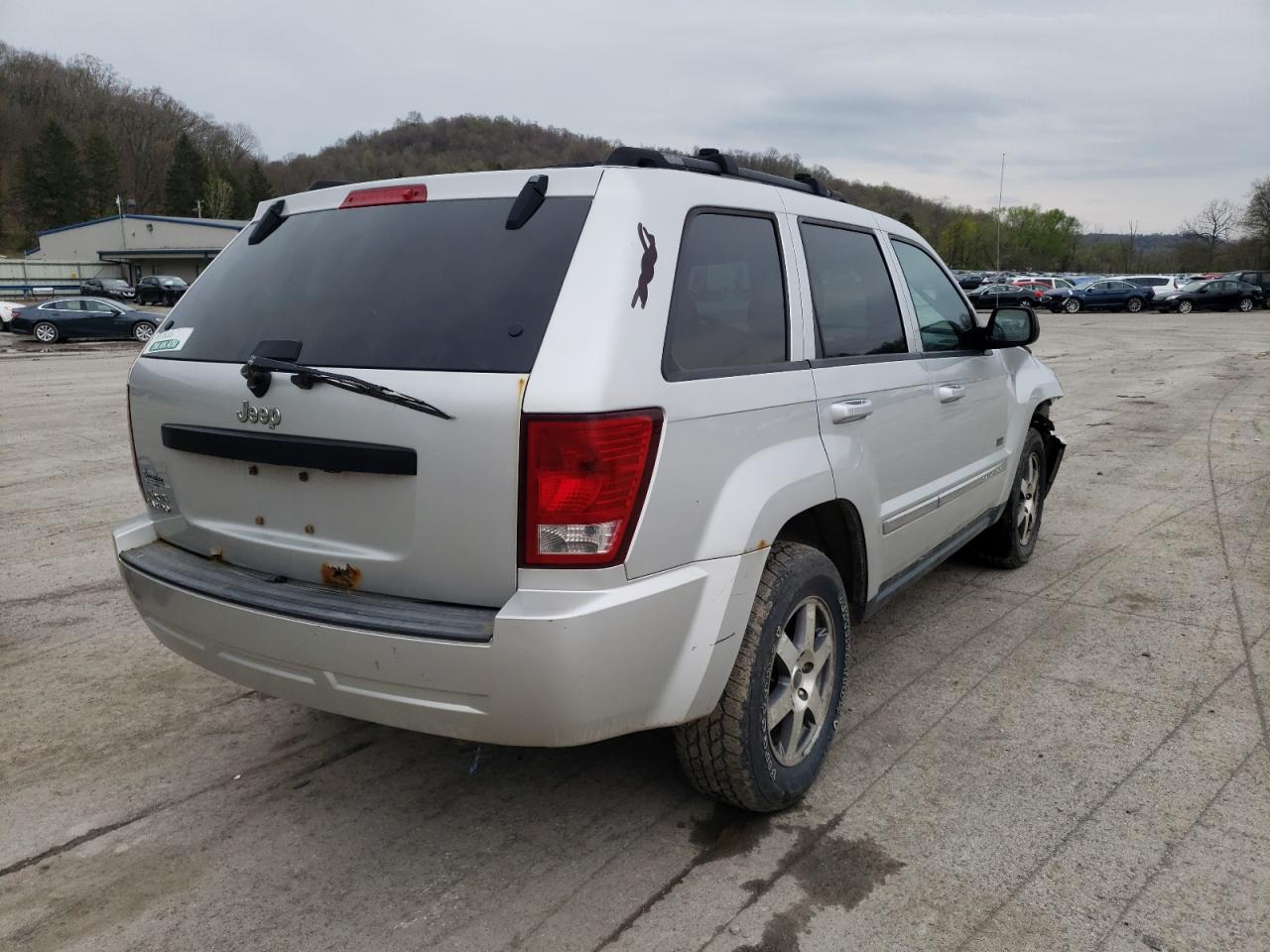 Photo 4 from auction – 2009 JEEP GRAND CHER with VIN 1J8GR48K69C549255