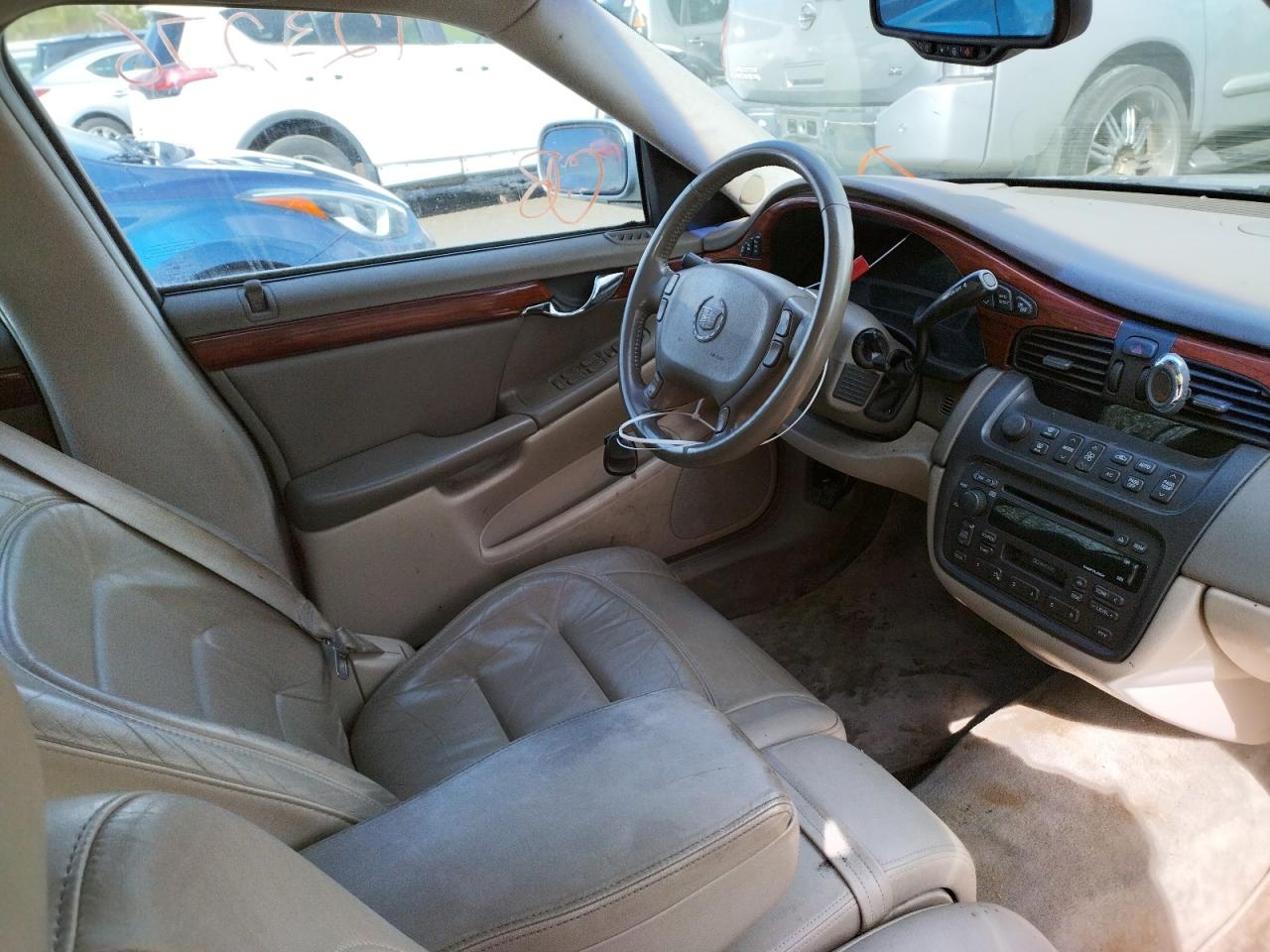 Photo 9 from auction – 2002 CADILLAC DEVILLE with VIN 1G6KD54Y02U109664