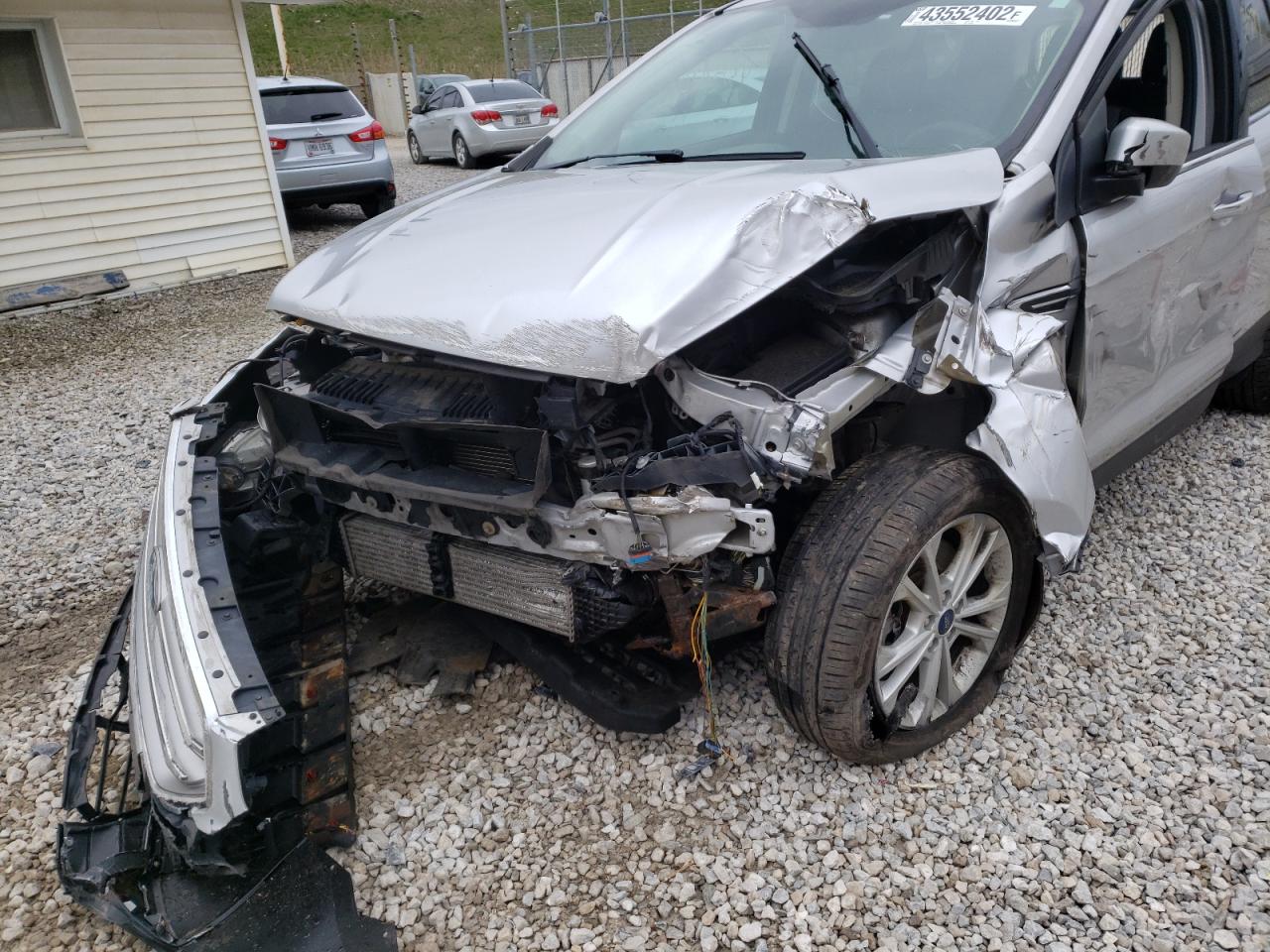 Photo 9 from auction – 2017 FORD ESCAPE SE with VIN 1FMCU9G99HUC35460