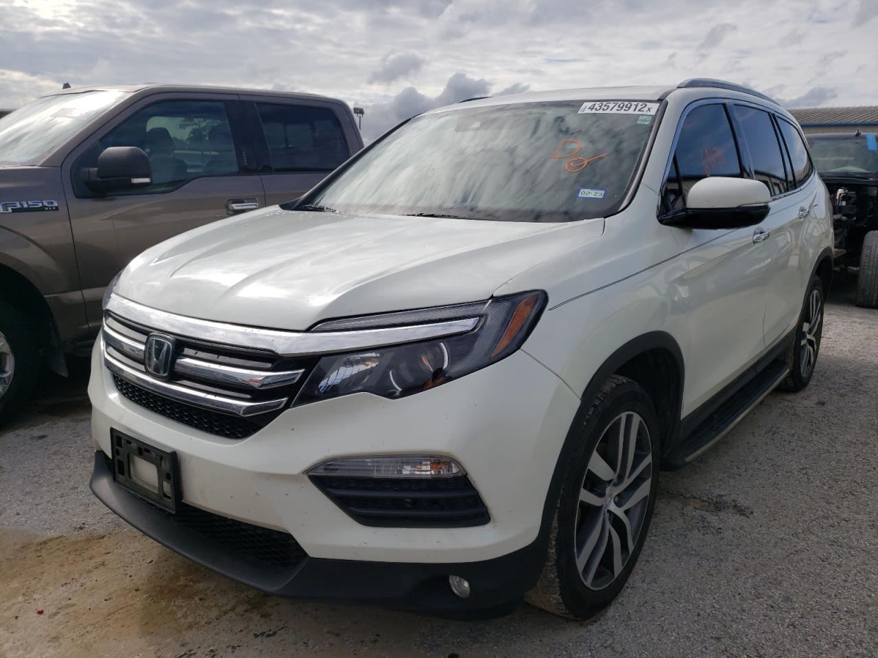 Photo 2 from auction – 2016 HONDA PILOT ELIT with VIN 5FNYF6H08GB116311