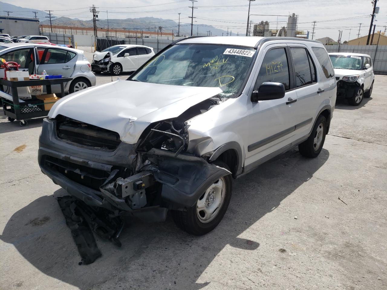 Photo 2 from auction – 2003 HONDA CR-V LX with VIN JHLRD68443C006914