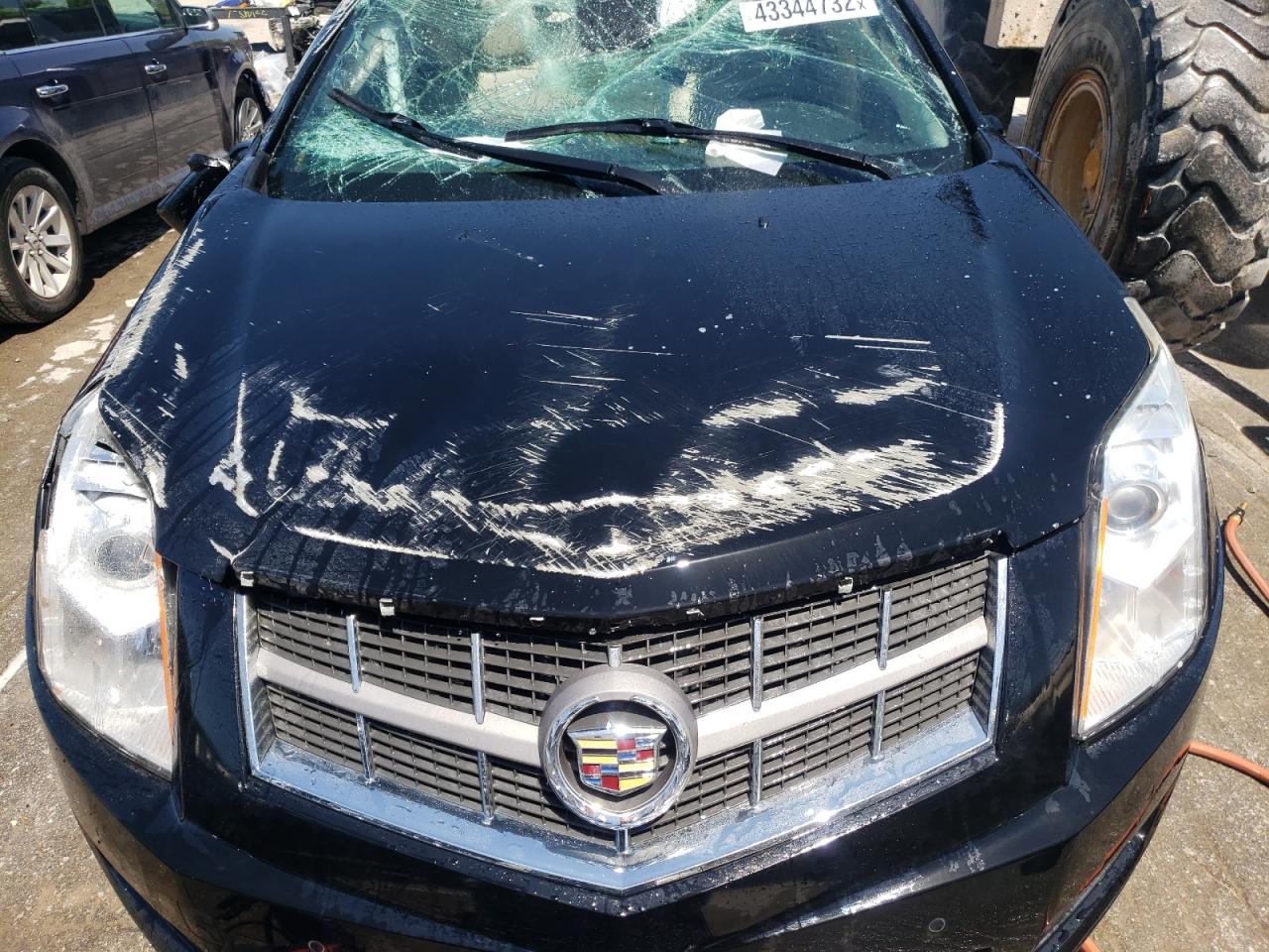 Photo 7 from auction – 2012 CADILLAC SRX LUXURY with VIN 3GYFNAE37CS510180
