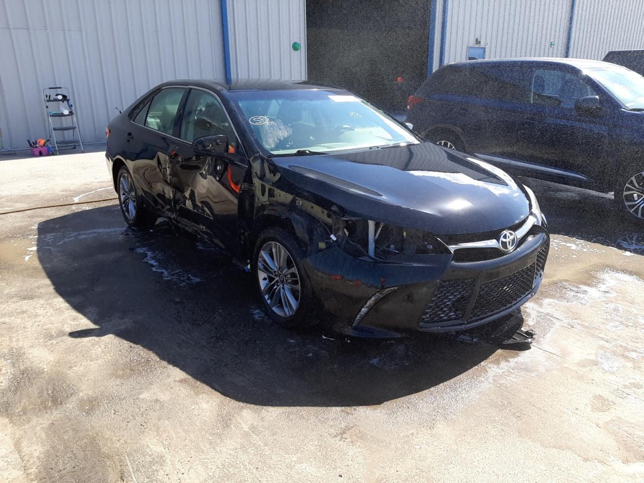 TOYOTA CAMRY LE 2017 with VIN 4T1BF1FKXHU304569 - Photo from auction
