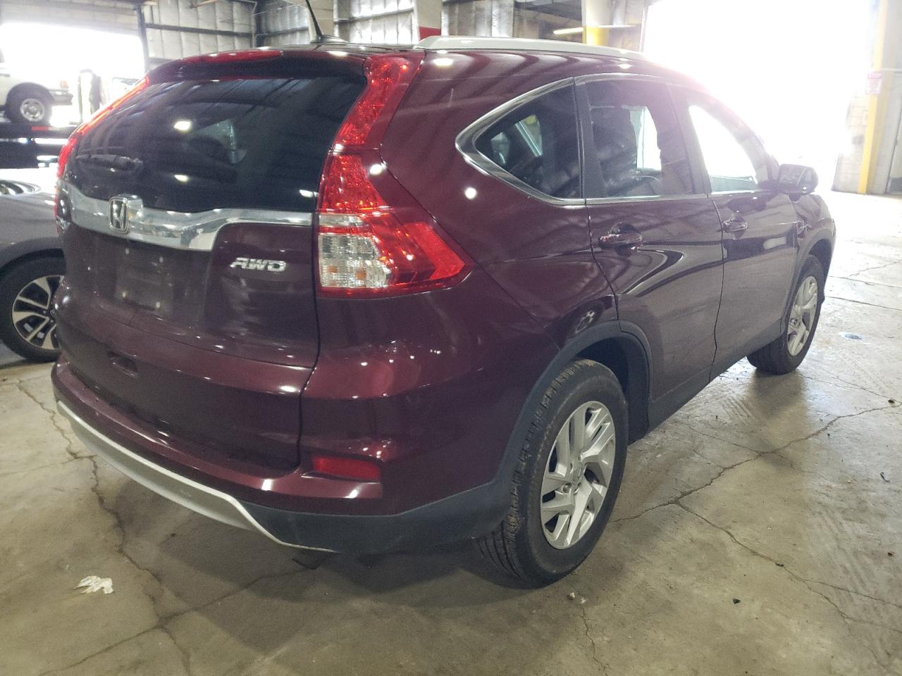 Photo 16 from auction – 2015 HONDA CR-V EXL with VIN 2HKRM4H76FH652458
