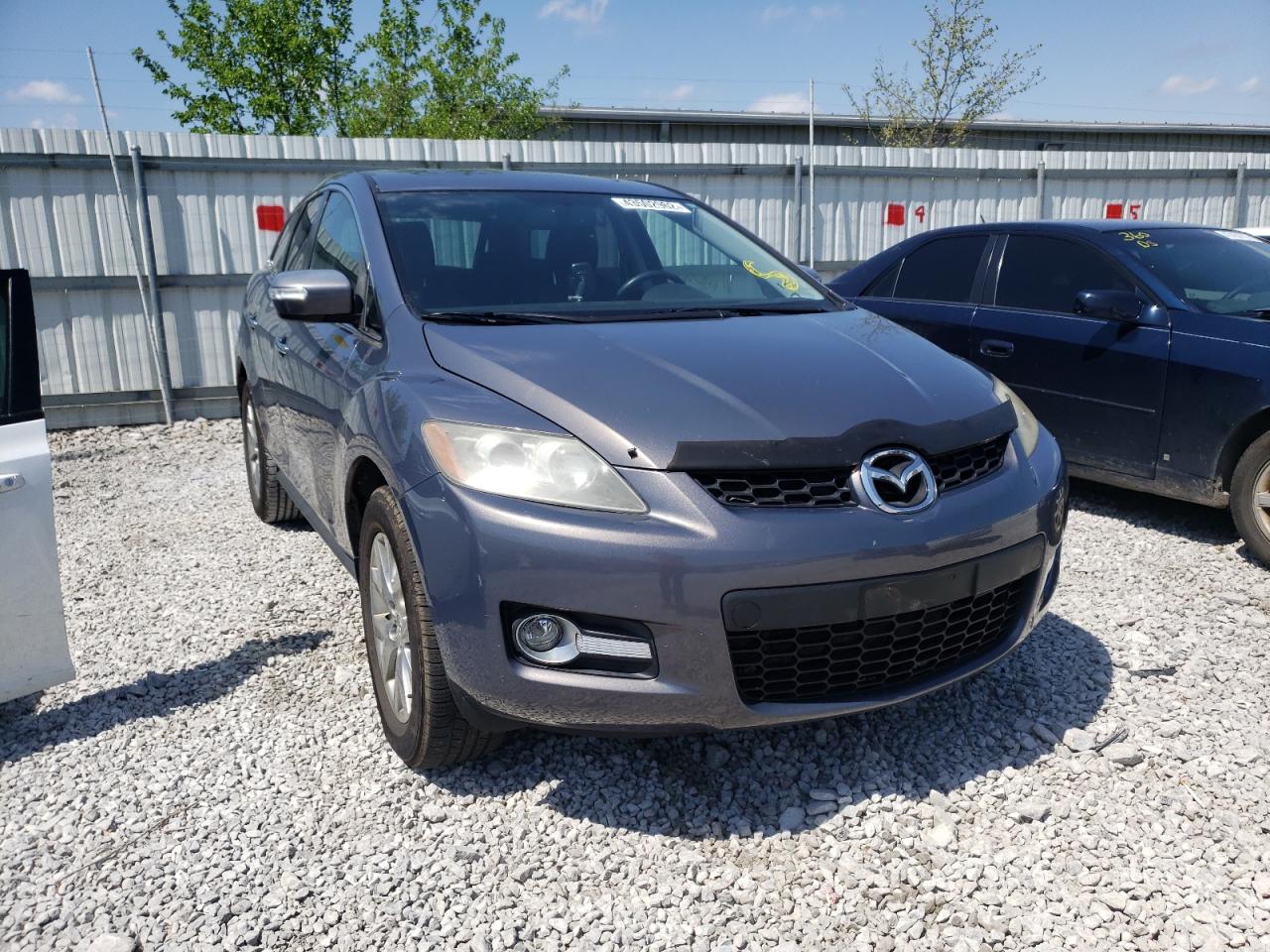 MAZDA CX-7 2009 with VIN JM3ER29LX90225745 - Photo from auction