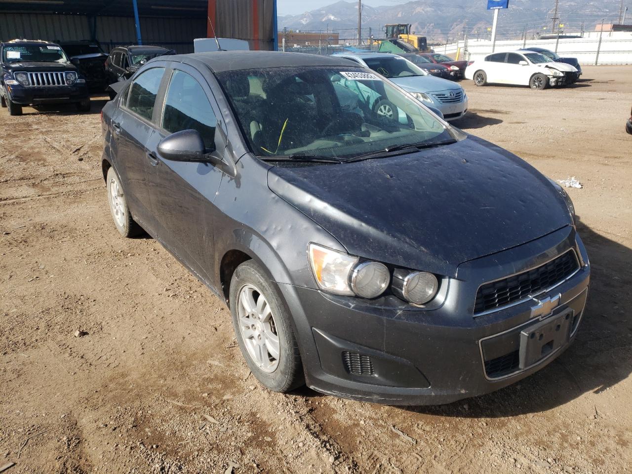 CHEVROLET SONIC LS 2012 with VIN 1G1JB5SH2C4200981 - Photo from auction