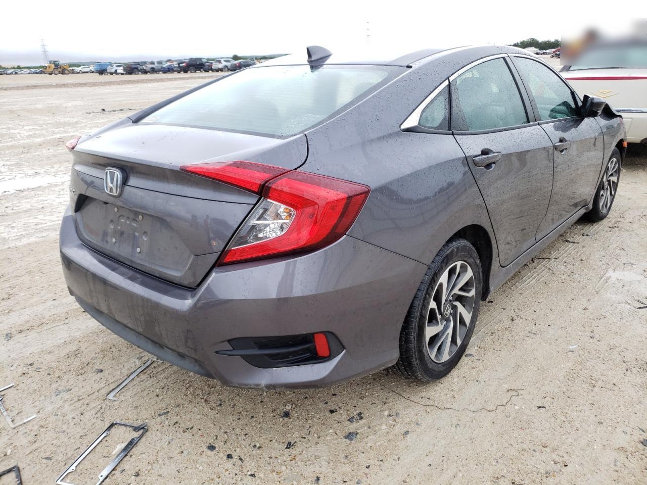 Photo 4 from auction – 2018 HONDA CIVIC EX with VIN 2HGFC2F7XJH580664