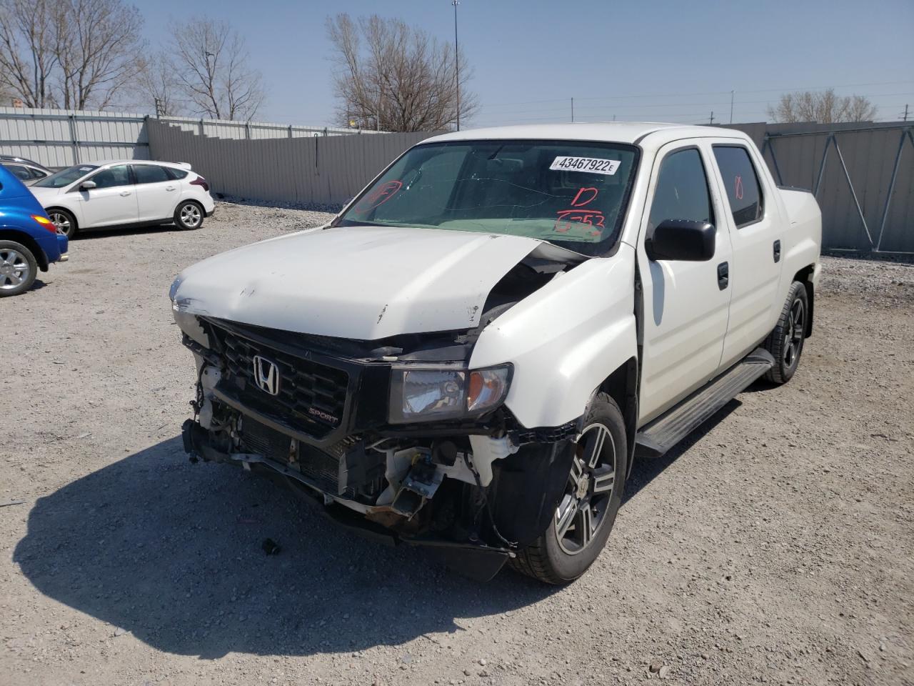 Photo 2 from auction – 2013 HONDA RIDGELINE with VIN 5FPYK1F79DB016753