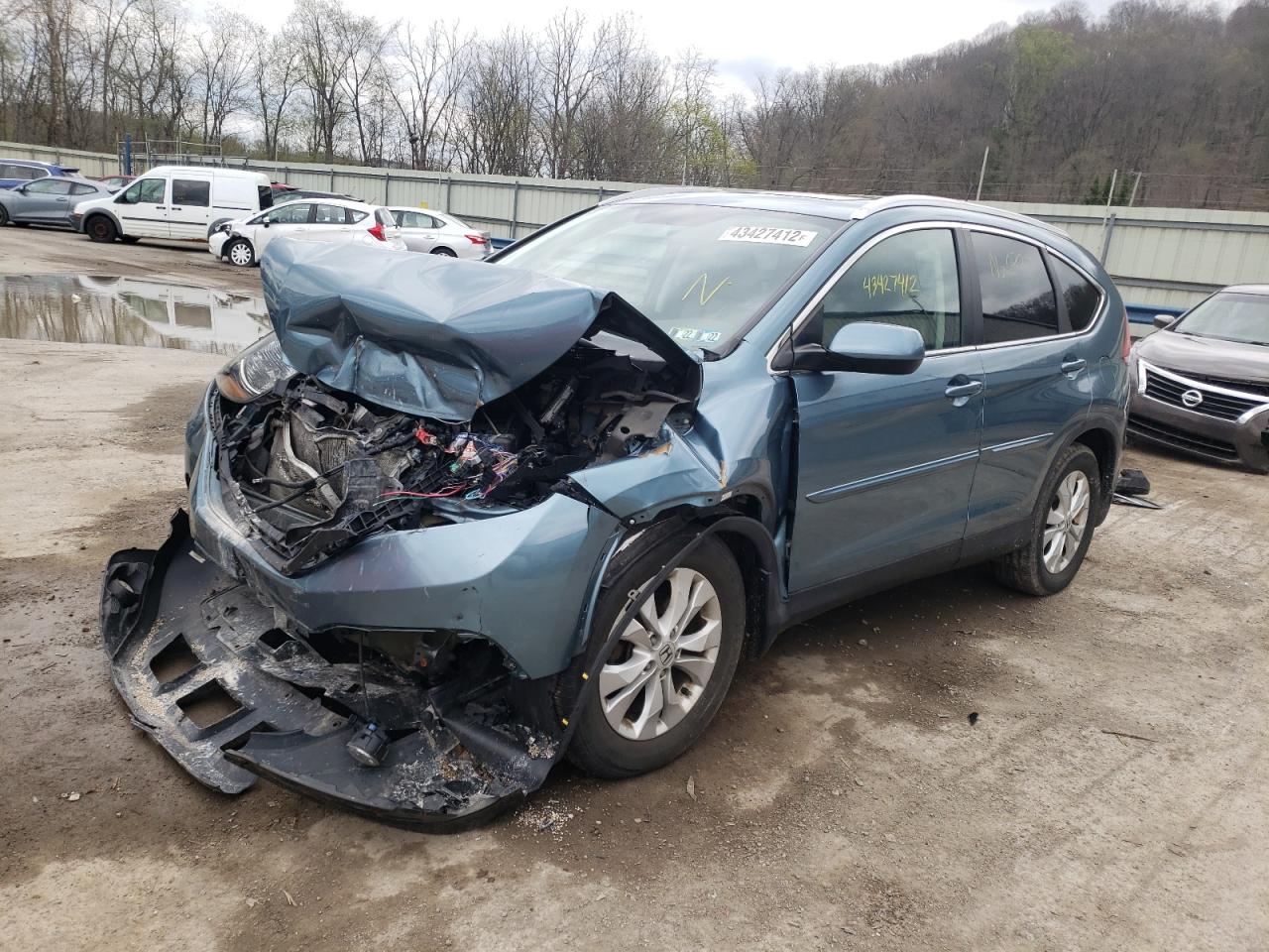 Photo 2 from auction – 2014 HONDA CR-V EXL with VIN 5J6RM4H77EL045229