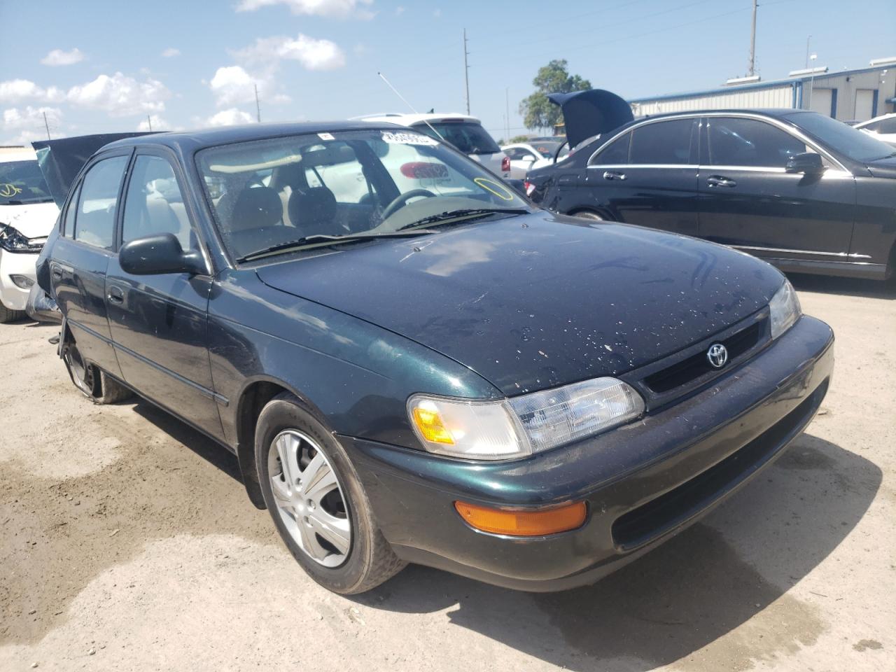 TOYOTA COROLLA DX 1997 with VIN 2T1BB02E9VC202344 - Photo from auction