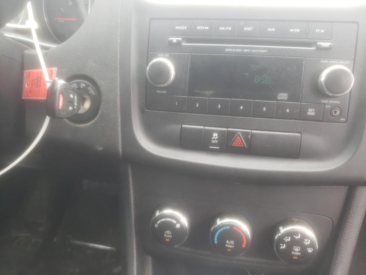 Photo 9 from auction – 2013 DODGE AVENGER SE with VIN 1C3CDZAB7DN566286