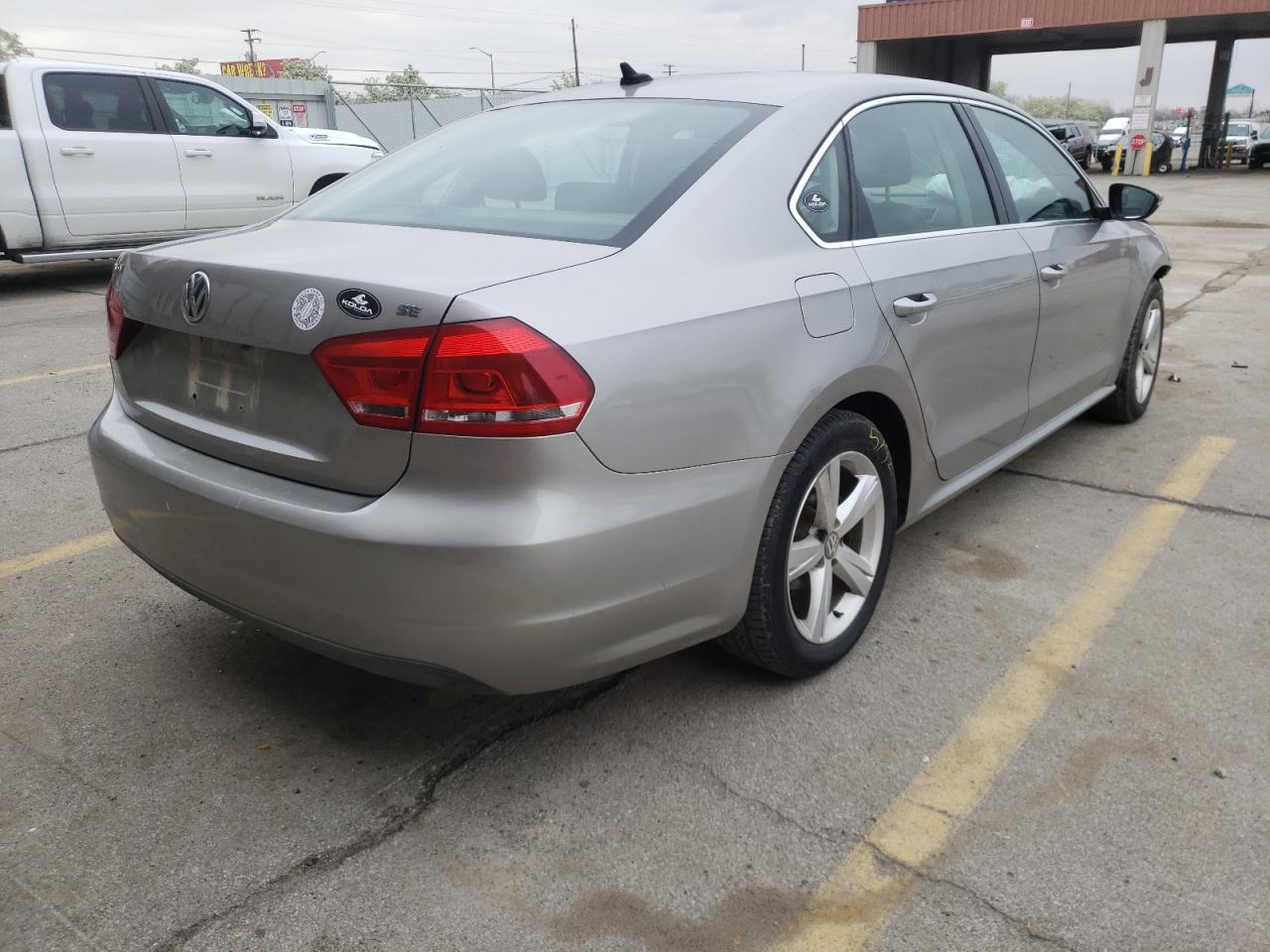 Photo 4 from auction – 2012 VOLKSWAGEN PASSAT SE with VIN 1VWBP7A36CC073959