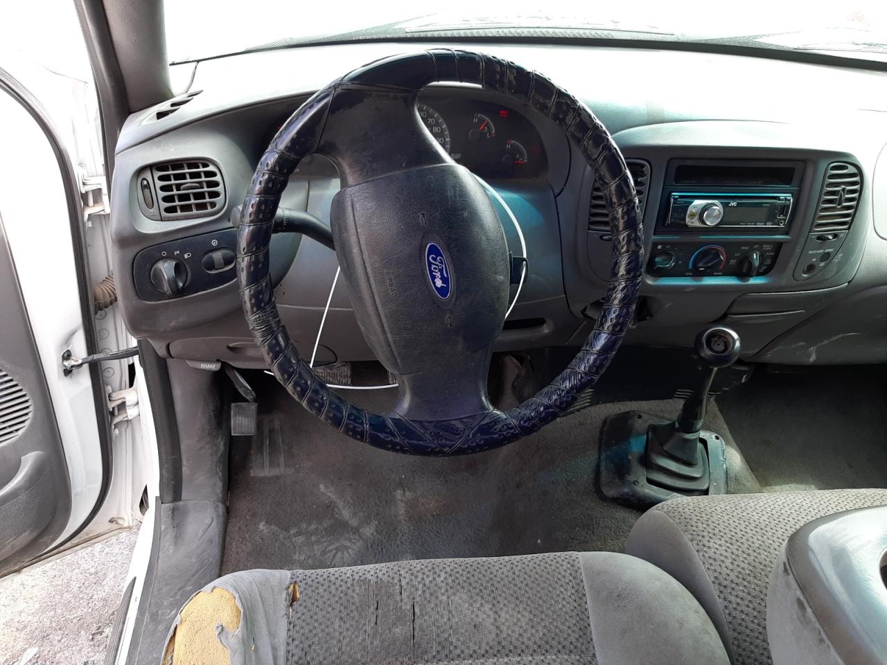 Photo 9 from auction – 2003 FORD F150 with VIN 1FTRF17283NB13107