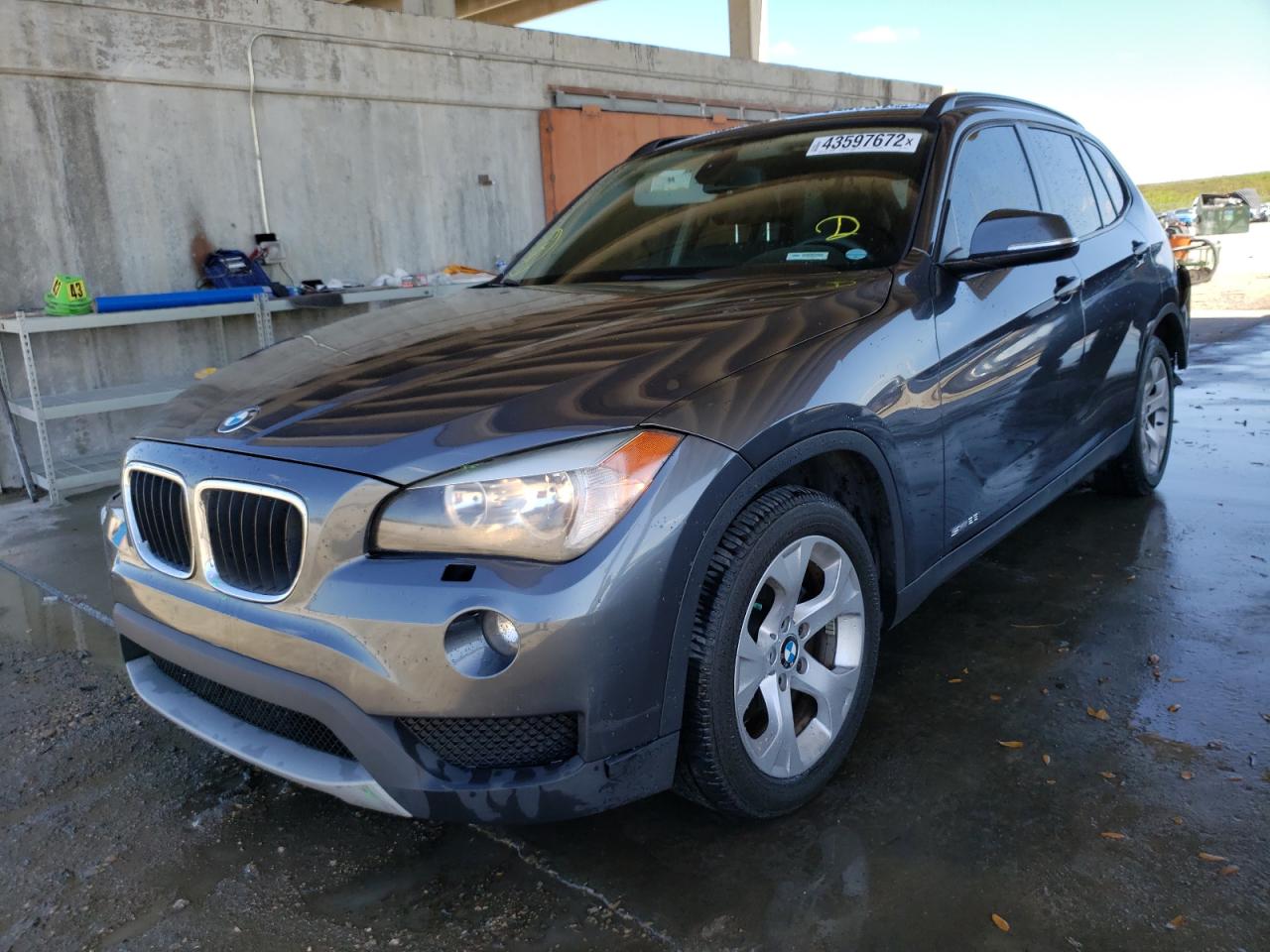 Photo 2 from auction – 2013 BMW X1 SDRIVE2 with VIN WBAVM1C54DVW42895