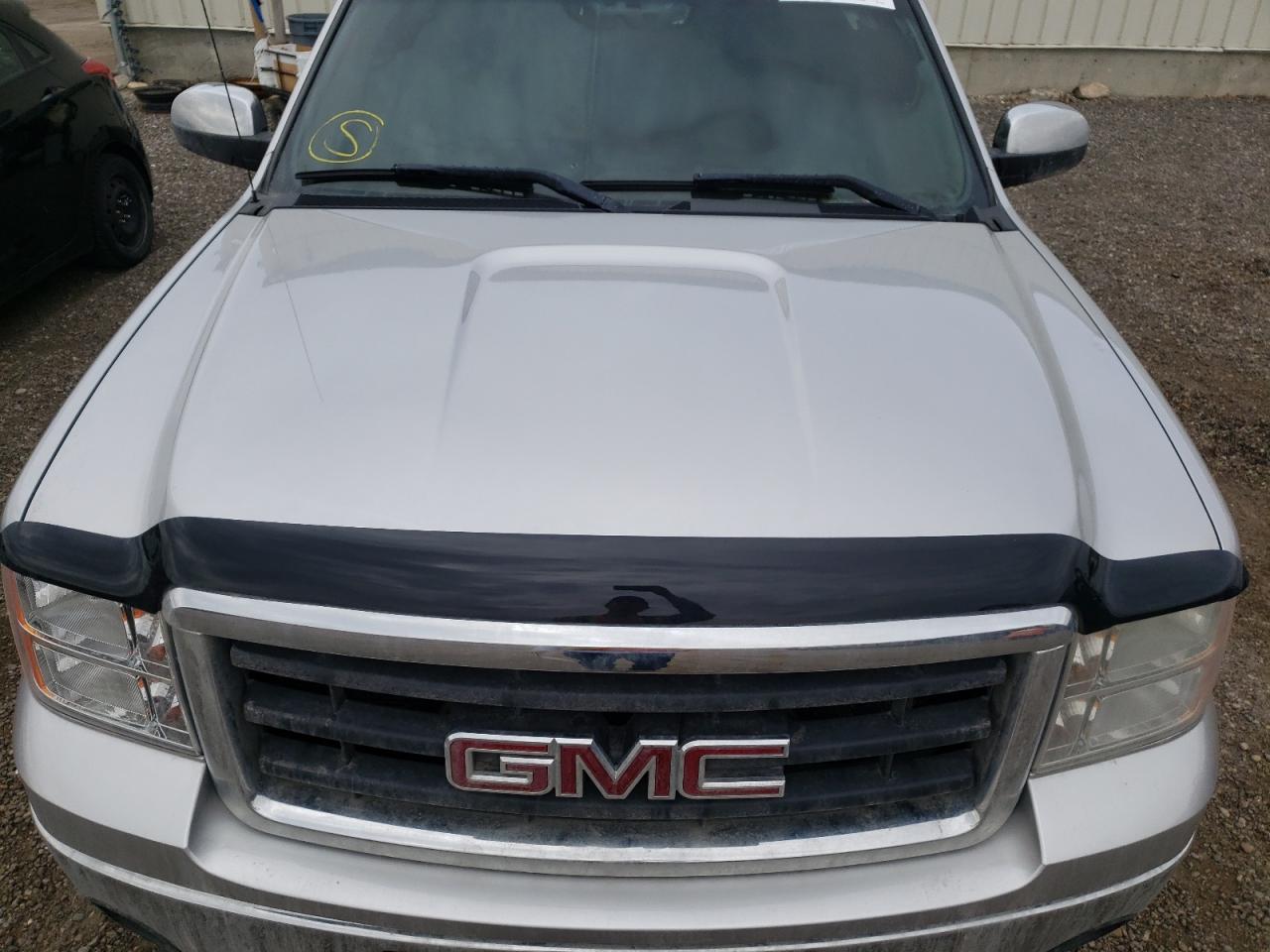 Photo 7 from auction – 2011 GMC SIERRA K15 with VIN 3GTU2YEJ2BG135135