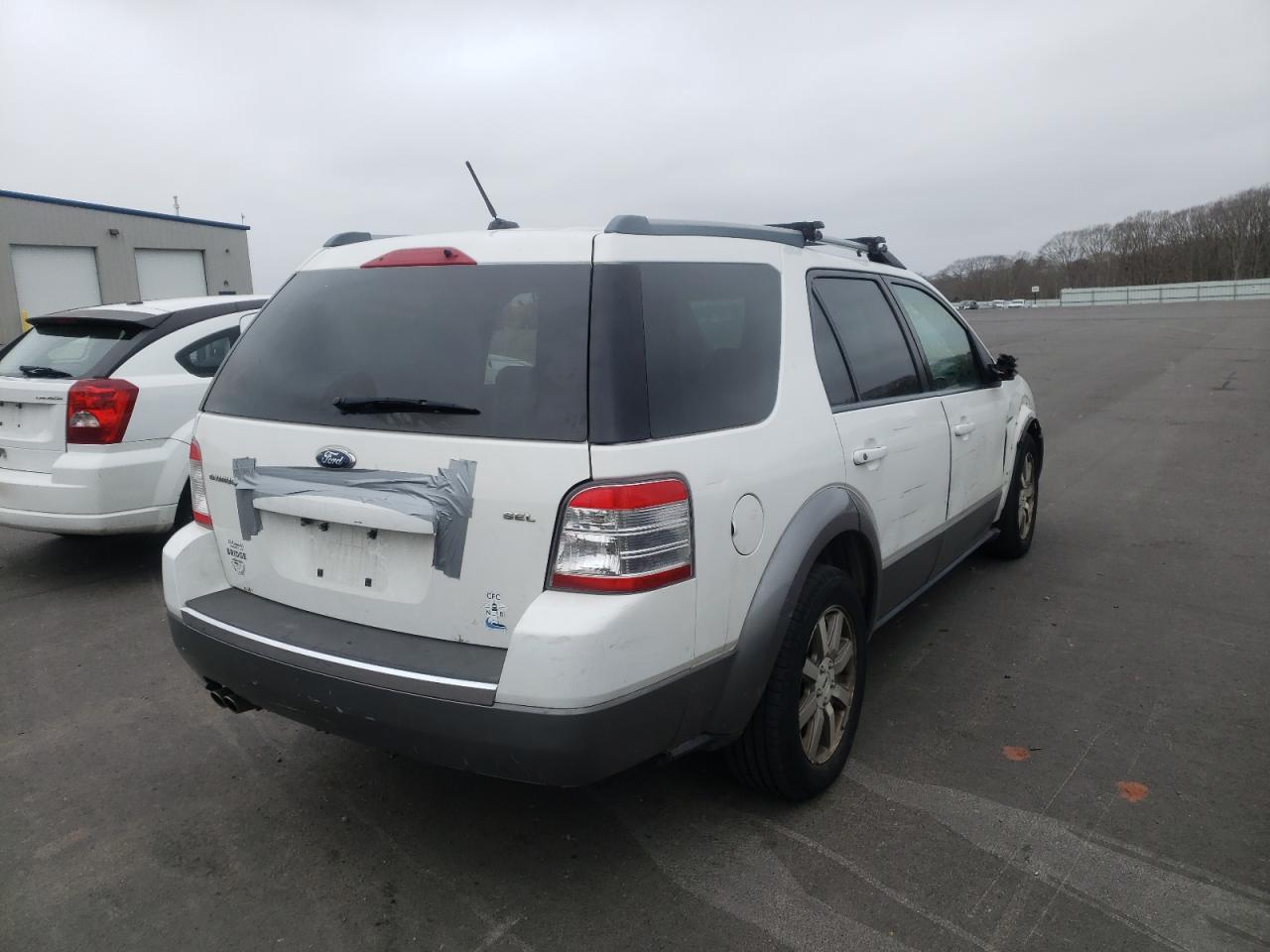 Photo 4 from auction – 2008 FORD TAURUS X S with VIN 1FMDK02W28GA27972