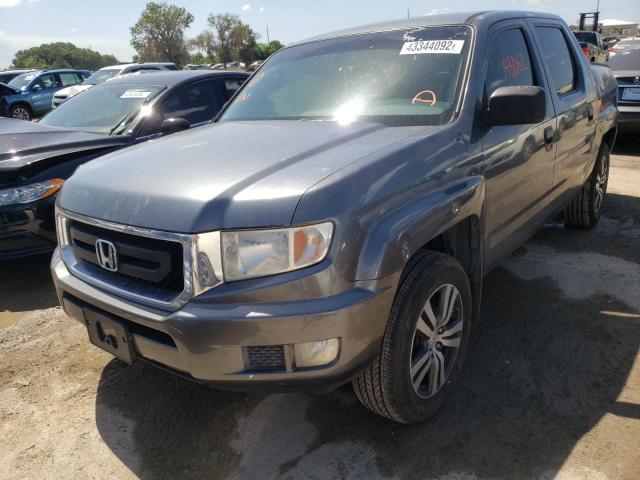 Photo 2 from auction – 2010 HONDA RIDGELINE with VIN 5FPYK1F20AB013076
