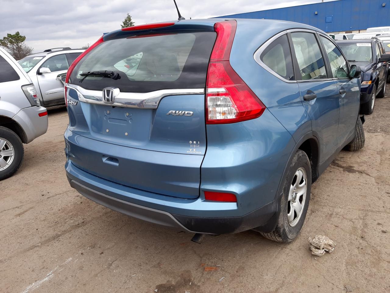 Photo 4 from auction – 2015 HONDA CR-V LX with VIN 5J6RM4H38FL071739