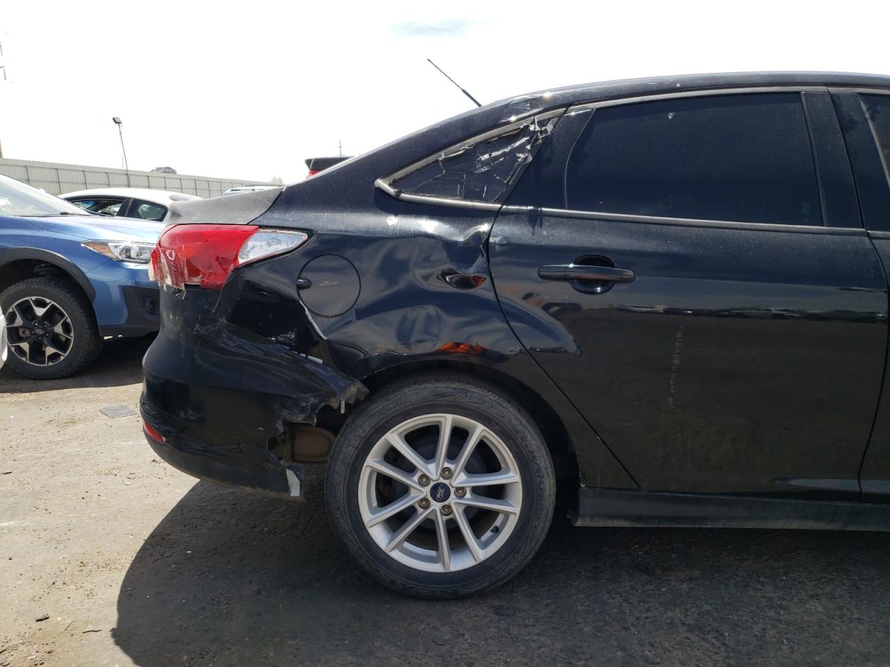 Photo 9 from auction – 2017 FORD FOCUS SE with VIN 1FADP3F29HL296482