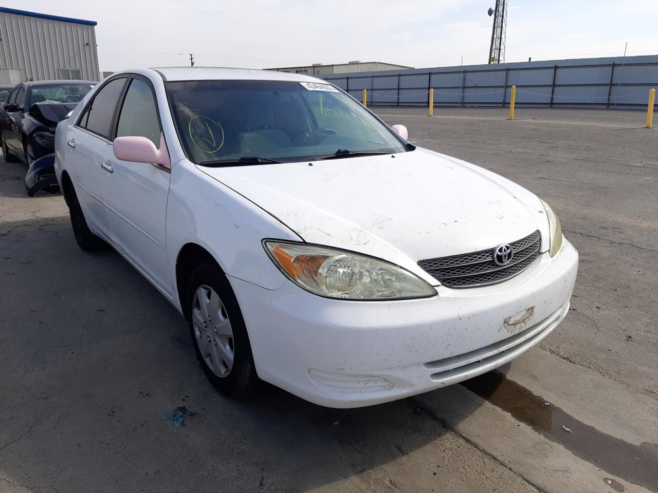 TOYOTA CAMRY LE 2002 with VIN JTDBE32K520070574 - Photo from auction