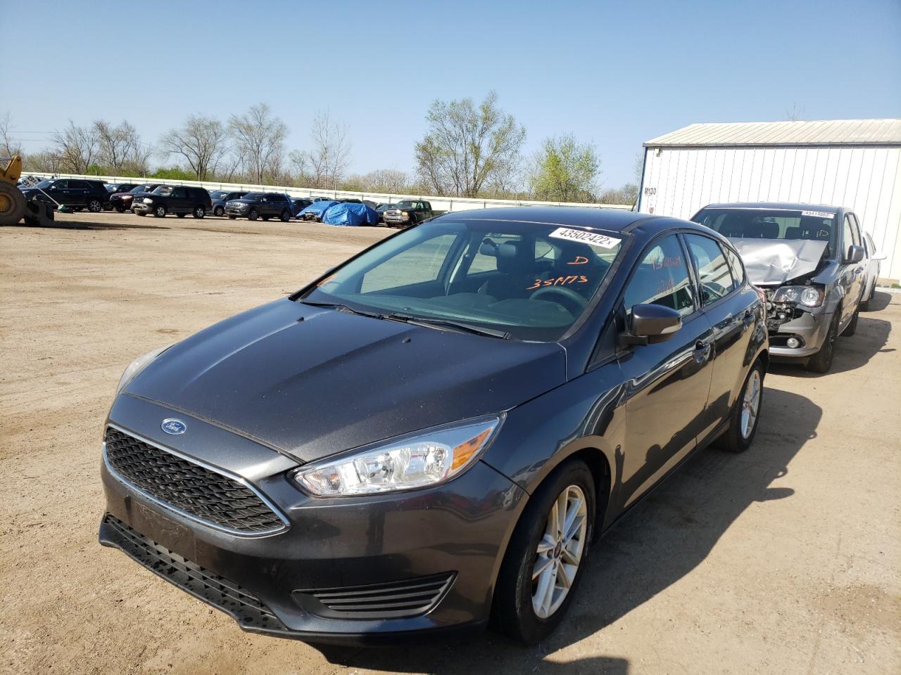 Photo 2 from auction – 2015 FORD FOCUS SE with VIN 1FADP3K26FL351473